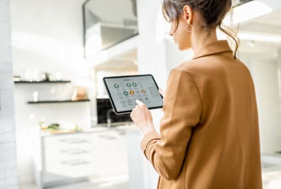 Woman using smart home electrical system